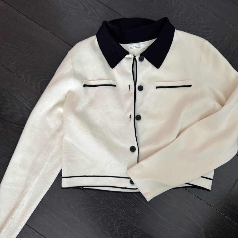 Elegant Cream Jacket with Black Accents